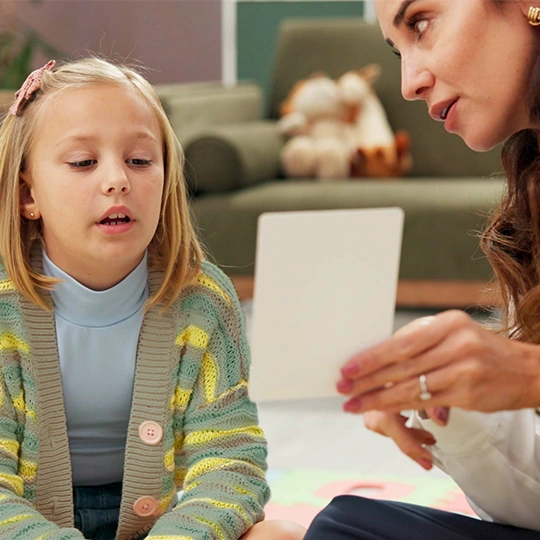 A parent and a clinician talking through a concern